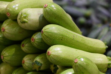 Fresh zucchini on the counter of the store