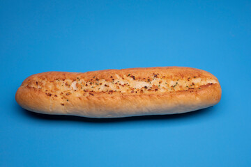 garlic bread on blue backround