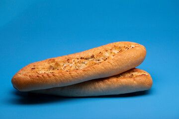 garlic bread on blue backround