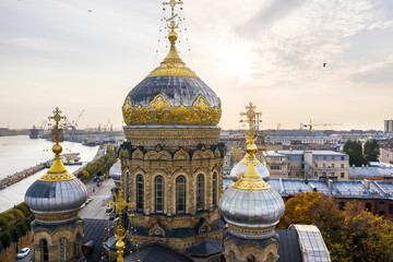 Fototapeta na wymiar aerial view of the Church of the Assumption of the Blessed Virgin Mary on Vasilievsky Island in St. Petersburg and the Neva River