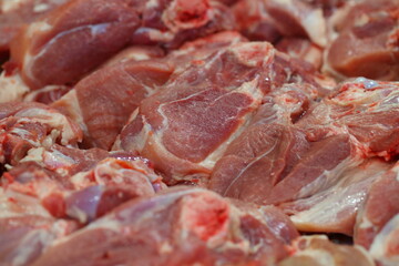 Raw pork chop on cutting board