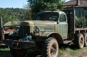 Old rusty soviet vintage heavy big truck closeup