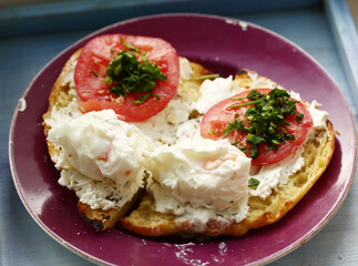hot chili tomato and pesto sauce, poached egg sliced roasted italian ciabatta bread for cooking bruschetta