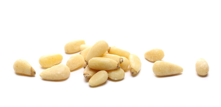 Pine nuts pile isolated on white background