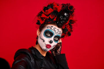 Closeup photo of funny folklore witch creature character death day facial creepy makeup masquerade....