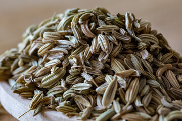 fennel seed in the wooden spoon