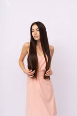Fototapeta premium Young woman with long hair. Brunette