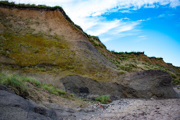 Nature background.  Soft focus of geological structure, landslide on steep coastal cliffs 