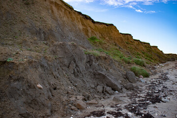 Nature background.  Soft focus of geological structure, landslide on steep coastal cliffs 