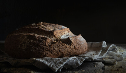 Closeup shot of freshly gluten free baked homemade sourdough bread on the table