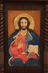 Fototapeta premium carved wood sculpture of a catholic church