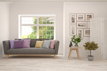 White living room with sofa and summer landscape in window. Scandinavian interior design. 3D illustration