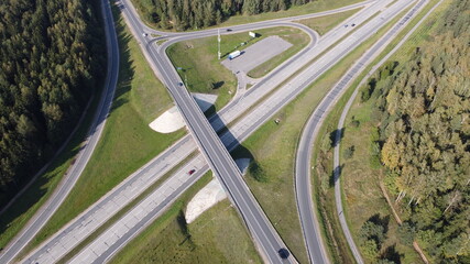 Top view of the crossroads with automobile bridge with highway and autobahn