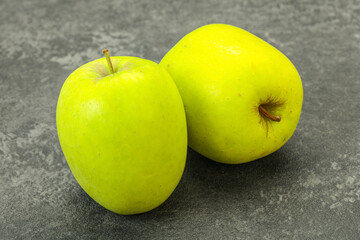 Two ripe green sweet apples