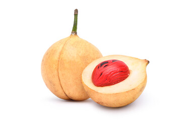  Fresh nutmeg fruit and cut in half  isolated on white background. Clipping path.