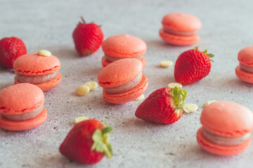 Macaroons. Delicious french desserts. Macaroons on the table. Macaroons with strawberries