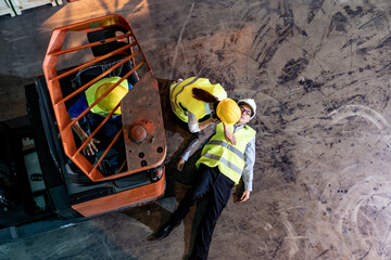 Warehouse worker call ambulance after accident top view