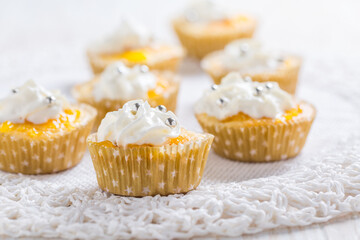 Homemade lemon curd cupcakes with whipped cream
