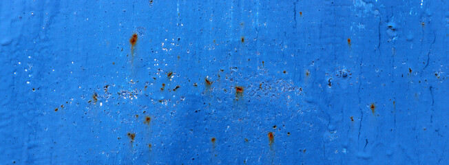 Abstract blue old paint on rusty matel wall