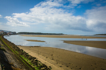 River and beach view of Caminha, Portugal with the Santa Tecra moutain in the background