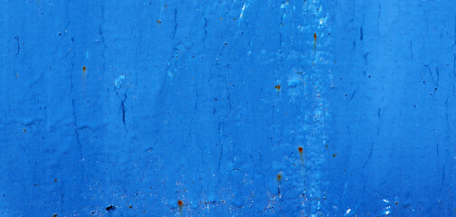Old crack metal surface with blue paint