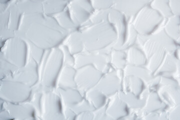 Fototapeta na wymiar Textured white background. Beautiful white background with a three-dimensional texture. Selective focus.