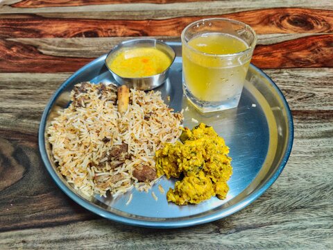 Indian non vegetarian thali with mutton biryani