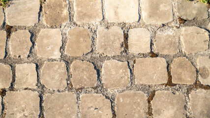 
Close-up of the paved square stone ground