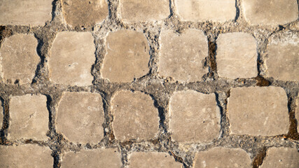 
Close-up of the paved square stone ground