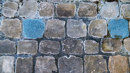 
Close-up of the paved square stone ground