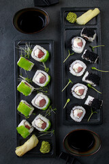 Seafood delicatessen sushi rolls set on plates