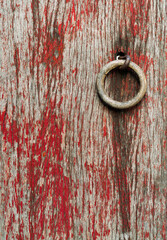 Red painted old wooden door.