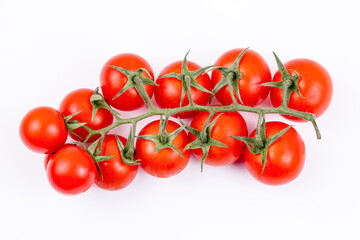 Fresh organic red tomatoes isolated on the background