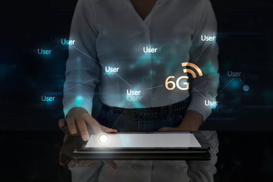 Business woman works on digital screen about wireless communication