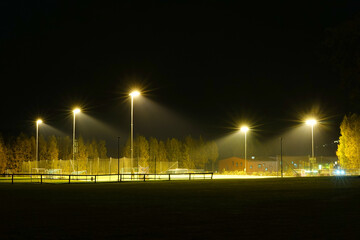 An image of stadium at night time