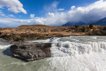 Fototapeta na wymiar Waterfall in torres del paine national park. High quality photo