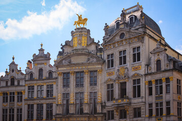 Fototapeta na wymiar Brussels, Belgium - May 11, 2018: View Of The Ancient Gothic Grand Place (Also Used Name Grand Square Or Grote Markt) Filled With Tourists On A Sunny Spring Day.