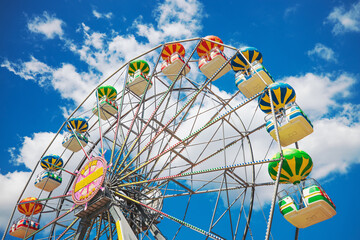 Ferris Wheel with Blue Sky and clouds