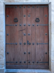 Solid door in an interior town of medieval origin