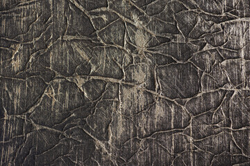 Obraz na płótnie Canvas texture paper background gold on black