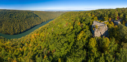Aerial drone image of the Coopers Rock state park overlook over the Cheat River in narrow wooded gorge in the autumn towards Cheat Lake Morgantown, WV