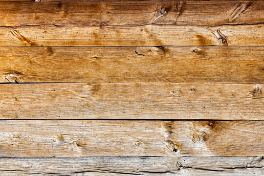 Old wooden beams wall of rustic house
