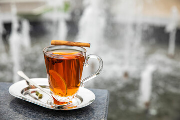 Hot mulled wine on a wooden table
