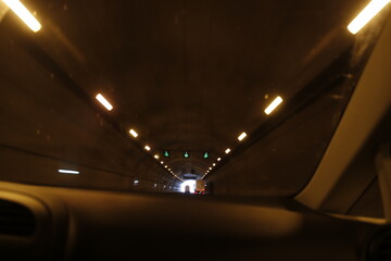 Naklejka premium Driving through a tunnel