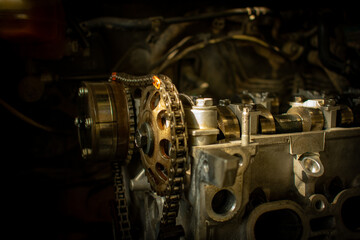 car engine insides chains with main engine in open close up view (concept idea or genius) in automobile service center or garage