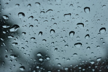 water drop or rain drop on glass closeup view beautiful background