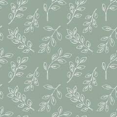 Seamless floral pattern with white hand drawn leaves on green background.