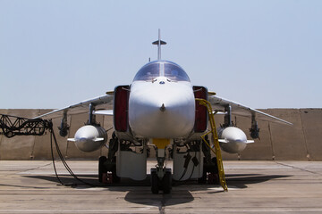 Fototapeta na wymiar Military fighter jet. Service before flight