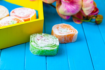 Turkish delight on a blue table.