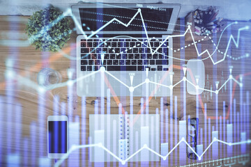 Multi exposure of financial chart drawing over table background with computer. Concept of research. Top view.